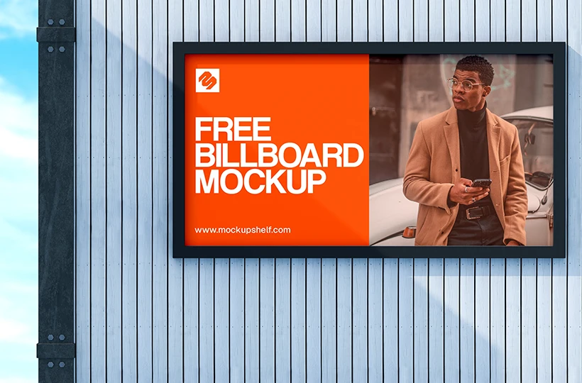 Outdoor Billboard Mockup – front view with container building and sky background | MockupShelf