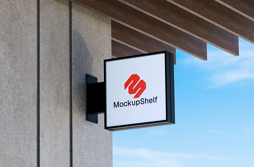 Free Logo Design Mockup – front angled view wall mounted signboard under wooden shade | MockupShelf