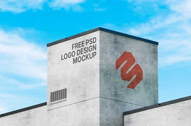 Industrial Logo Design Mockup – front angled view on concrete building wall | MockupShelf