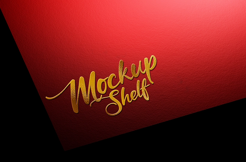 Gold Embossed Logo Design Mockup – front angled view on red textured background | MockupShelf