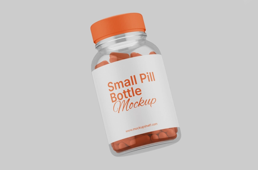 Free Pill Bottle Mockup – front view of small transparent bottle with orange cap on gray background | MockupShelf