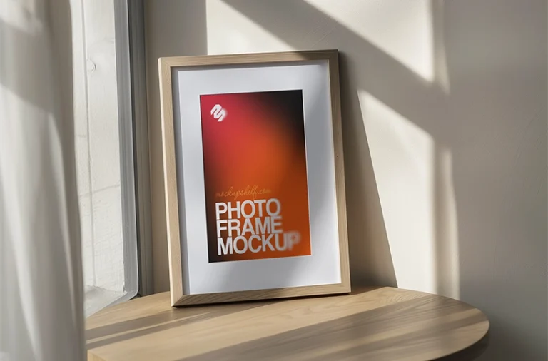 Free tabletop photo frame mockup PSD with vertical frame near window and natural shadow depth