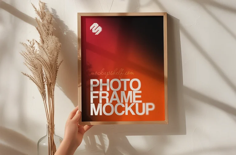 Free handheld photo frame mockup PSD with vertical frame and natural wall shadow depth