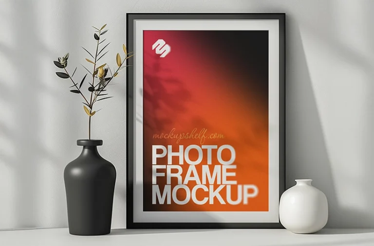 Free interior photo frame mockup PSD with vertical frame, wall texture, and decorative tabletop setup