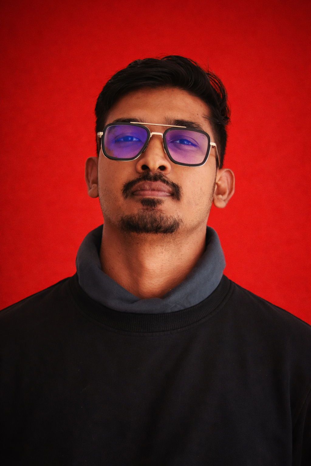 Portrait of Abhijith K, graphic designer and founder of MockupShelf