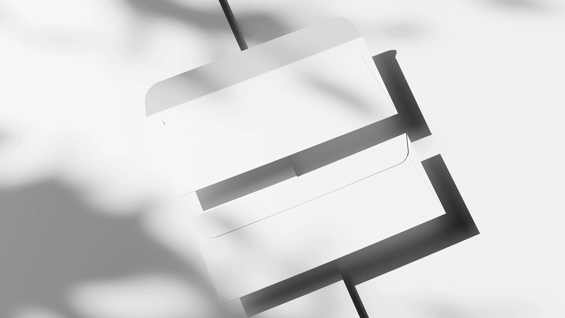 Blank two envelope mockup on a flat surface
